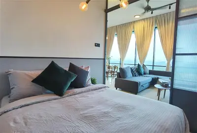 a bedroom with a large bed and a living room at MyCrib Opus Recidence 3 bedroom BBintang in Kuala Lumpur