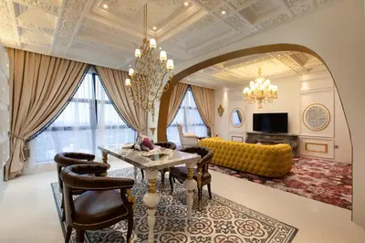 a living room with a table and chairs and a couch at arte by Thomas Chan in Kuala Lumpur