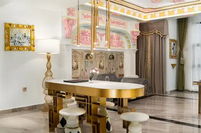 a lobby with a table and chairs in a room at arte by Thomas Chan in Kuala Lumpur