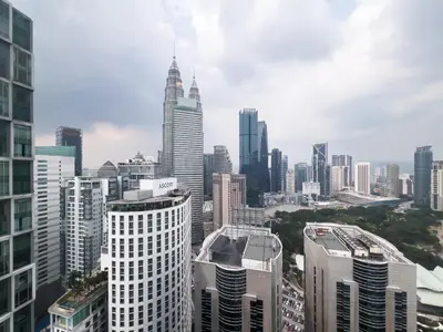 a view of a city with tall buildings at Soho Suites KLCC by GuestHouse in Kuala Lumpur