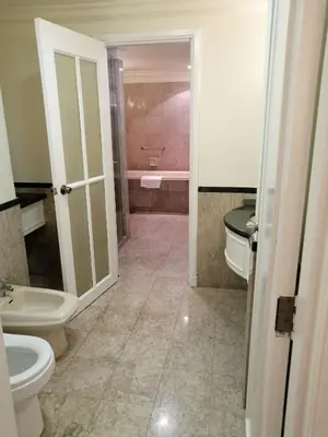 a bathroom with two toilets and a sink at KL Time Square suit At Times square in Kuala Lumpur