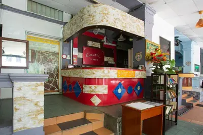 a restaurant with a colorful counter in a store at SPOT ON 90137 Casavilla Hotel Pudu in Kuala Lumpur