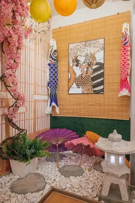a room with umbrellas and a painting on the wall at Fahrenheit88-Japan Theme Bukit Bintang Kuala Lumpur 2R2B 6Pax in Kuala Lumpur