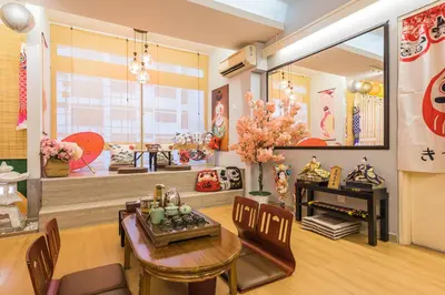 a dining room with a table and chairs and a window at Fahrenheit88-Japan Theme Bukit Bintang Kuala Lumpur 2R2B 6Pax in Kuala Lumpur