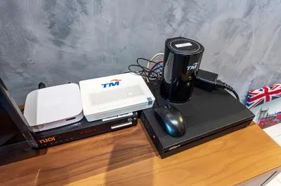 a desk with a computer and a mouse and a laptop at 3BR Family-Friendly Landed House,PandanPerdana,KL by Verano in Kuala Lumpur