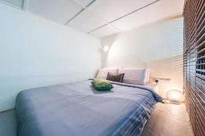 a bedroom with a bed with a pillow on it at 3BR Family-Friendly Landed House,PandanPerdana,KL by Verano in Kuala Lumpur