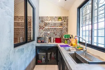 a kitchen with a sink and a counter at 3BR Family-Friendly Landed House,PandanPerdana,KL by Verano in Kuala Lumpur