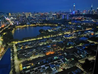 an aerial view of a city at night at M City Lake View 1+1 Room in Kuala Lumpur