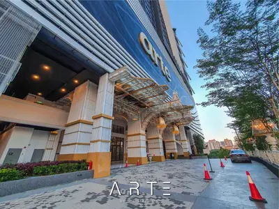 a building with a sign on the side of it at Arte Mont Kiara Luxury Suite with Heated Jacuzzi Pods - Free Parking - Next to MITEC- by The Stay Hub in Kuala Lumpur