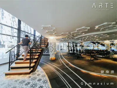 a man walking down the stairs of a cruise ship at Arte Mont Kiara Luxury Suite with Heated Jacuzzi Pods - Free Parking - Next to MITEC- by The Stay Hub in Kuala Lumpur