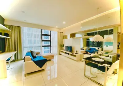a living room with a couch and a table at Robertson PanoramaKL Suites in Kuala Lumpur