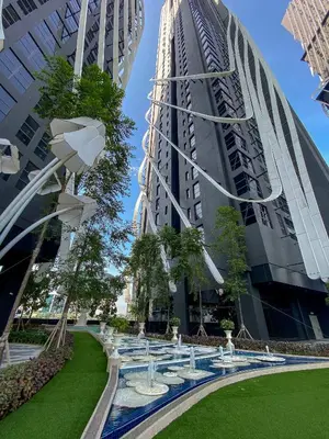 a view of two tall buildings in a city at Arte Mont Kiara by CozyNest in Kuala Lumpur