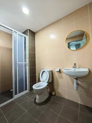 a bathroom with a toilet and a sink at Razak City Residence at Sungai Besi, Kuala Lumpur by Liberty Homes in Kuala Lumpur
