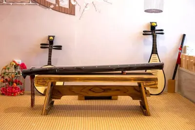 a bench in a room with crosses on the wall at Fahrenheit88 - China Theme Kuala Lumpur Bukit Bintang in Kuala Lumpur