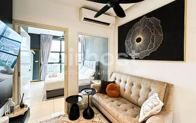 a living room with a couch and a mirror at Arte Mont Kiara by Airhost in Kuala Lumpur