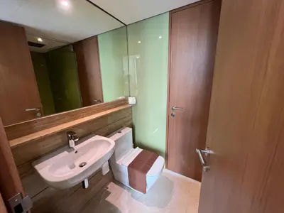 a bathroom with a sink and a mirror at Sky Suites KLCC by GENESIS in Kuala Lumpur