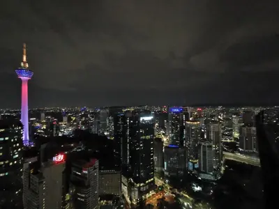 a view of a city skyline at night at Sky Suites KLCC by Autumn Suites Premium Stay in Kuala Lumpur