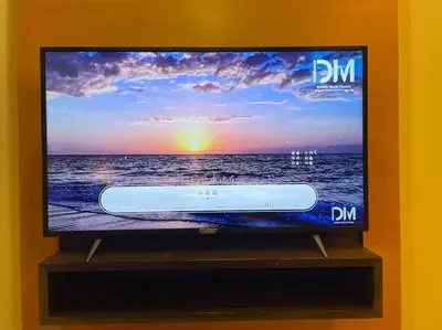 a flat screen tv sitting on a stand at Stylish Romantic Couples Getaway at KL City 1419 in Kuala Lumpur