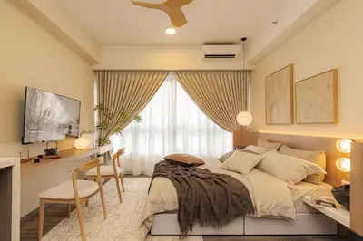 a bedroom with a bed and a desk with a chair at Agile Delima Residence Bukit Bintang in Kuala Lumpur