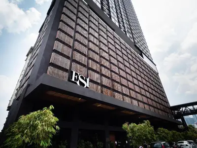 a tall building with the rst sign on it at KL Sentral Loft , EST Bangsar #2, LRT in Kuala Lumpur