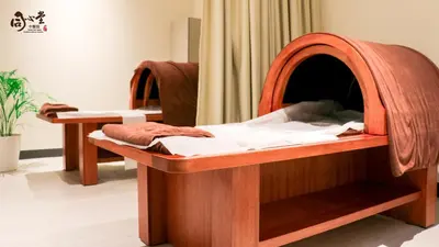 a couple of beds in a room at Hotel Komune Living & Wellness Kuala Lumpur in Kuala Lumpur