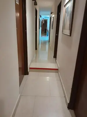 a hallway in a building with a hallway at FKI INTERNATIONAL HOTEL in Kuala Lumpur