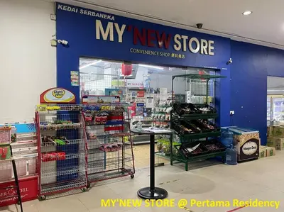 a new store with a blue wall in a store at Private Jacuzzi Staycation at KL City 1014 in Kuala Lumpur