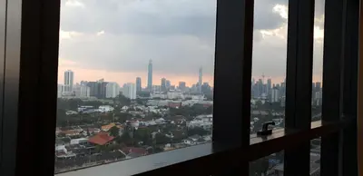 a view of a city skyline from a window at MCity Jalan Ampang KLCC in Kuala Lumpur