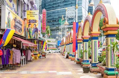 a street in a city with shops and buildings at KL Sentral Loft, EST Bangsar #3, LRT in Kuala Lumpur