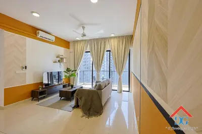 a living room with a couch and a tv at Astoria Ampang in Kuala Lumpur