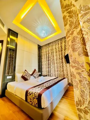 a bedroom with a large bed in a room at Dorsett Residence Service Suite At Bukit Bintang KL in Kuala Lumpur
