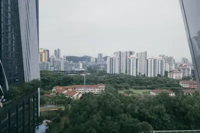 a view of a city with tall buildings and trees at Arte Mont Kiara 3pax Jacuzzi Pool Gym near MITEC Matrade in Kuala Lumpur