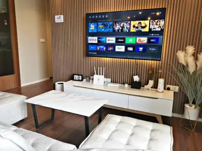 a living room with a large tv on a wall at ※THE UNIQUE HOME @ KL※ SUNWAY VELOCITY-TRX ◆2-7PAX in Kuala Lumpur