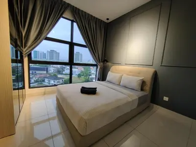 a bedroom with a large bed with a large window at Nj Homestay at Arte Mont Kiara in Kuala Lumpur