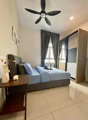 a bedroom with a bed with a ceiling fan at TR Residence Near Titiwangsa LRT By Iconique in Kuala Lumpur