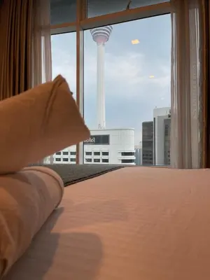 a view of the space needle from a hotel room at Vortex Suites klcc by Rit in Kuala Lumpur
