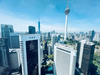 an aerial view of a city with skyscrapers at Vortex Suites klcc by Rit in Kuala Lumpur