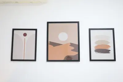 four framed art prints on a wall at New Arcoris 6 Pax 2 BR with Pool View Mont Kiara - BOHO in Kuala Lumpur