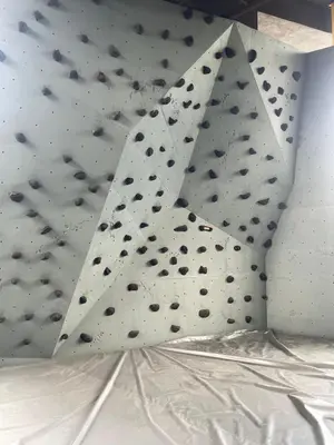 a white wall with black dots on it at Opus Residences Warisan Merdeka by C&C Fortune in Kuala Lumpur