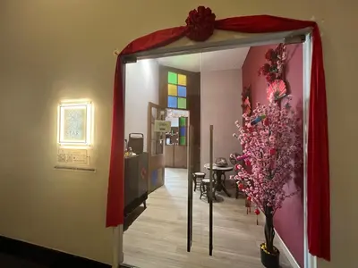 a hallway with a red curtain and a mirror at Star Suite 5min Walk to KLCC Netflix in Kuala Lumpur