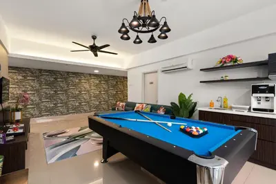 a living room with a pool table at Fahenheit 88, Kuala Lumpur 17 in Kuala Lumpur