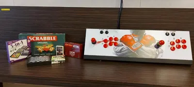 a table with two books and a board game at Fahenheit 88, Kuala Lumpur 17 in Kuala Lumpur