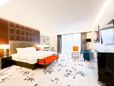 a large hotel room with a bed and a couch at Platinum 2 by DM Suites KLCC , Kuala Lumpur in Kuala Lumpur