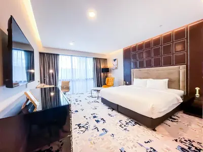 a hotel room with a bed and a desk at Platinum 2 by DM Suites KLCC , Kuala Lumpur in Kuala Lumpur