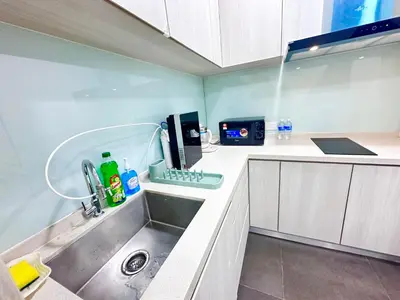 a kitchen with a sink and a counter top at Velocity Residence at Sunway mall in Kuala Lumpur