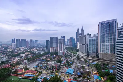 an aerial view of a city with tall buildings at Colony @ Kampung Baru by Plush in Kuala Lumpur