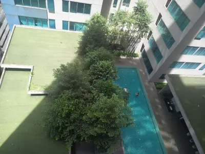 an overhead view of a swimming pool in a building at CUSHY APARTMENT at KLCC in Kuala Lumpur
