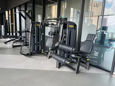 a row of exercise bikes in a gym at Opus Residences Merdeka Tower 118 View in Kuala Lumpur
