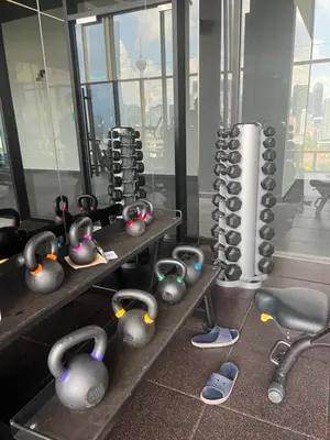 a room with a bunch of bowls on the floor at Opus Residences Merdeka Tower 118 View in Kuala Lumpur