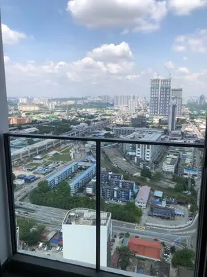 a view of a city from a window at Lucky Continew Residence 1 Bedroom - TRX KL in Kuala Lumpur
